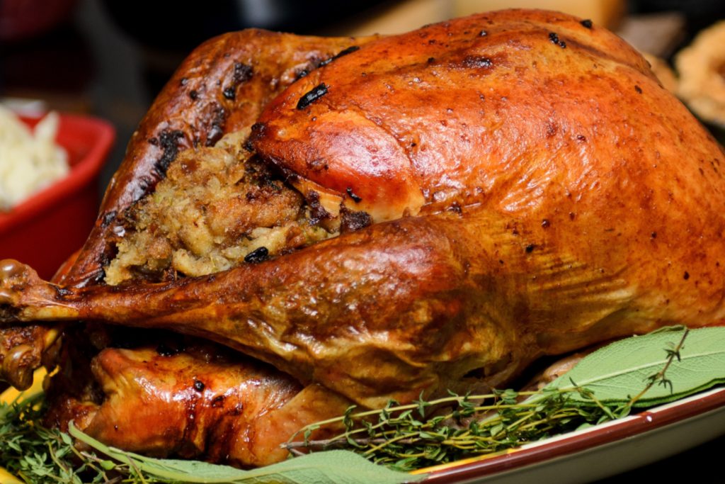 Fosters-Thanksgiving-Fall-Ham-Turkey-Thanksgiving Debate-Cayman Islands-Meat-Food-Gravy Boat-Turkey Gravy-Cranberry-Sweet Potato Pie-Stuffing